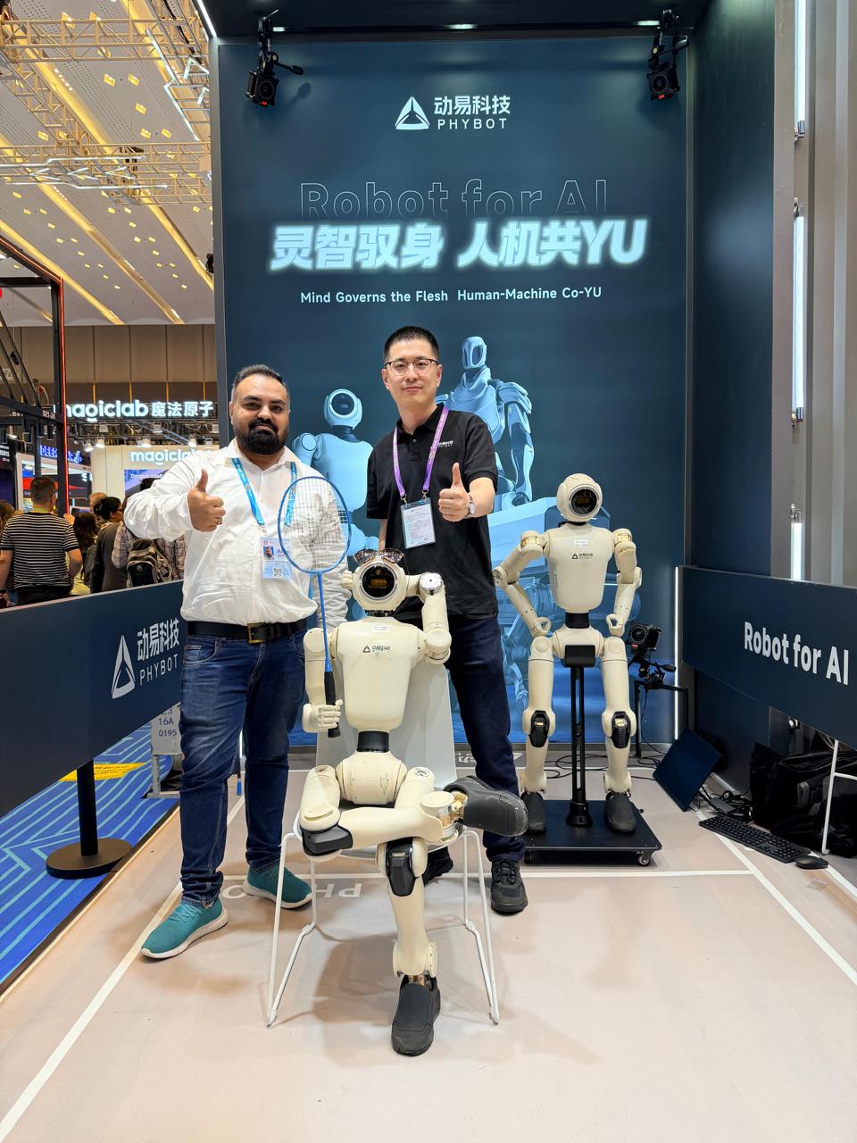 Nexera Sourcing team visiting a humanoid robotics exhibitor booth